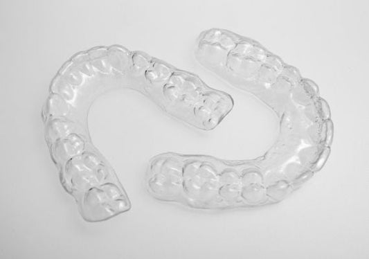 Image of upper and lower Essix clear retainers. 