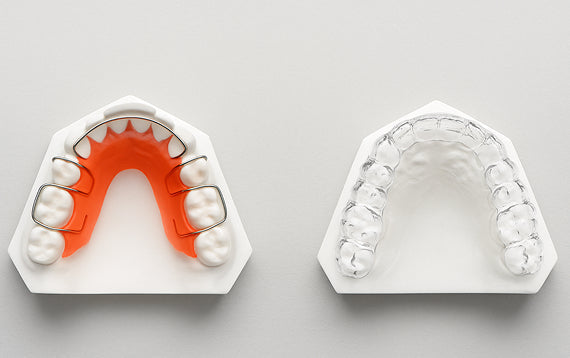 Hawley retainers and Clear retainers placed side by side.