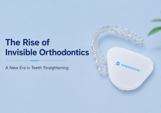  Clear aligners and case on a blue background.