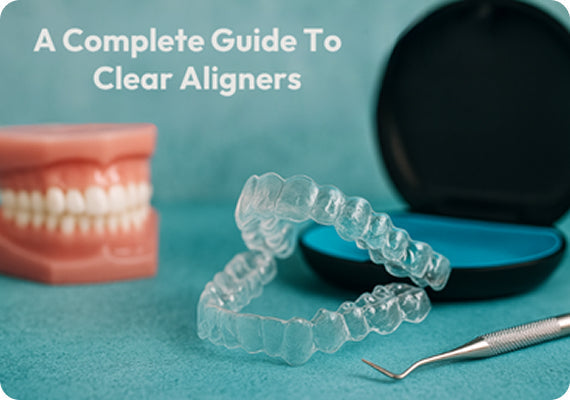 An image of aligners and a dental model, with text that says “A complete guide to clear aligners